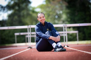 Hockerill 269  hurdles girl sitting down