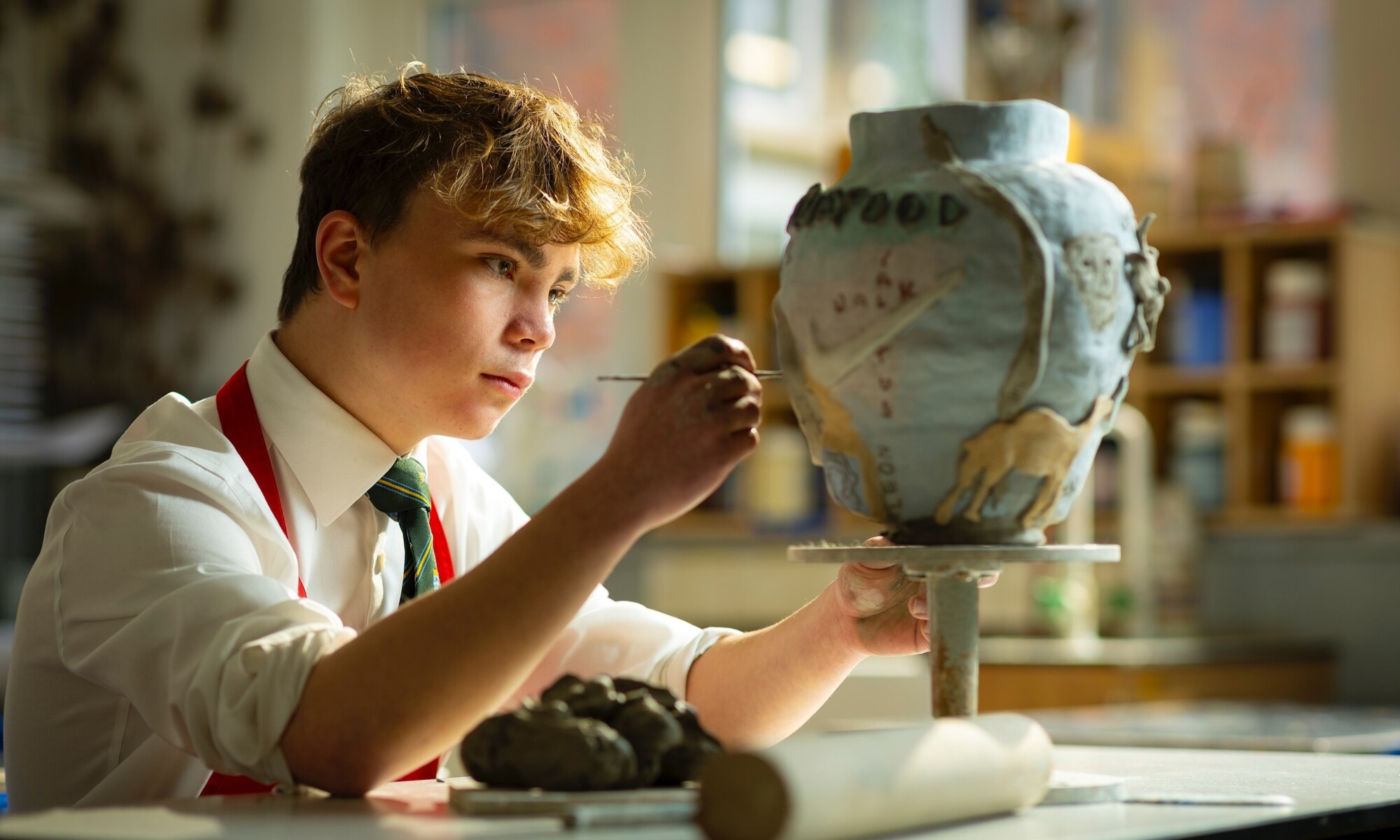 Hockerill Student Working on a Sculpture